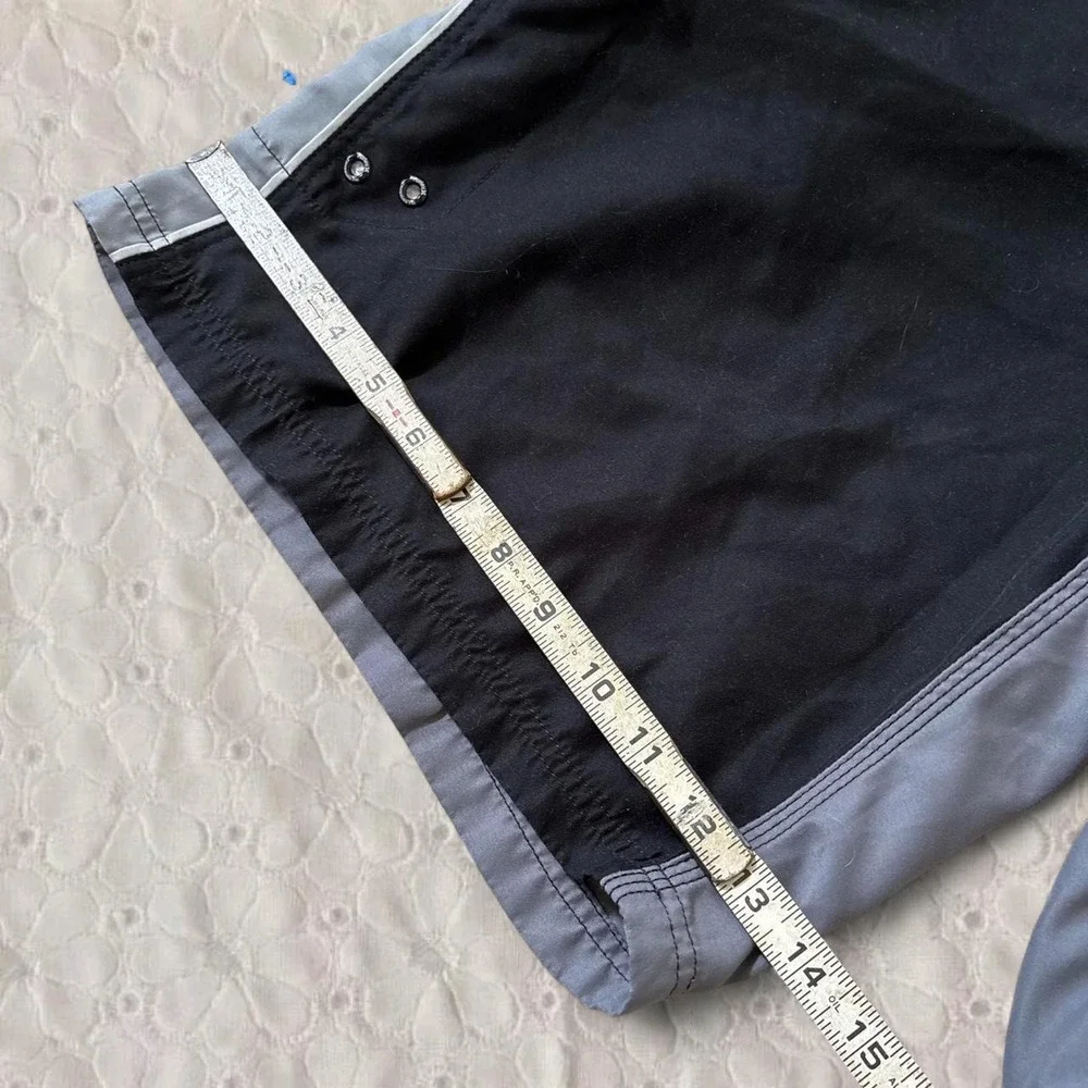 Hurley black and grey board shorts with gray side panels, size 38/XL